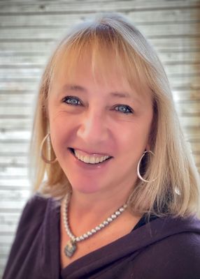 Portrait of Carol Spirig, Re Assoc Broker.